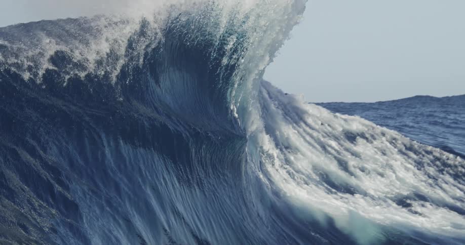 Wave breaking in the turquoise blue sea
