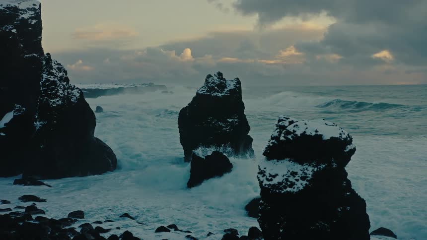 Waves crash against the rocks