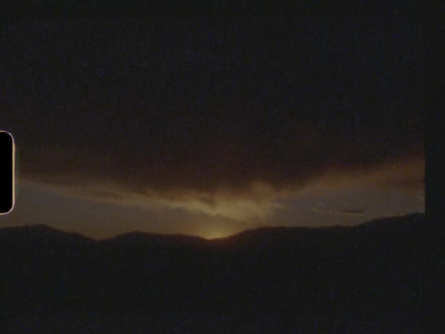 View of the sunrise behind the mountains