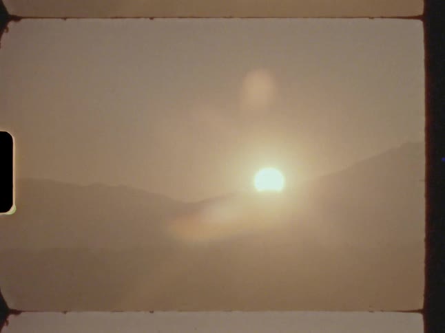 View of the sunrise behind the mountains