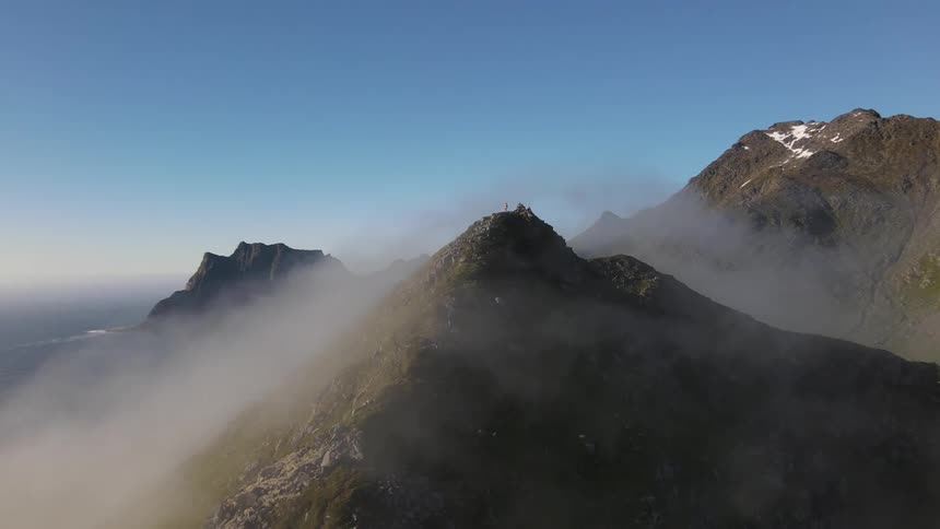 Mountain tops covered in dews at midday