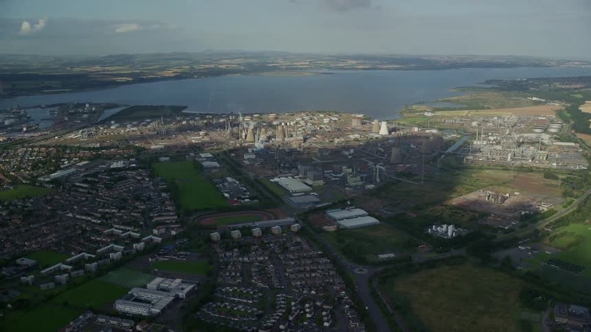 Aerial view of a coastal city next to a river