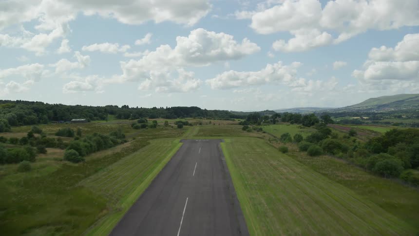 View from an airplane taking off in an outdoor and natural environment
