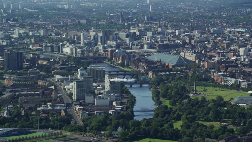 Urban city area with factories and vegetation in the surroundings