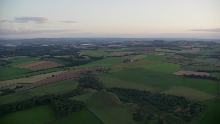 Aerial view of an agricultural area with extensive pasture