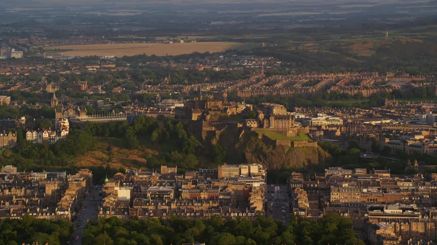 Aerial view of an urban city with a stadium monastery and houses