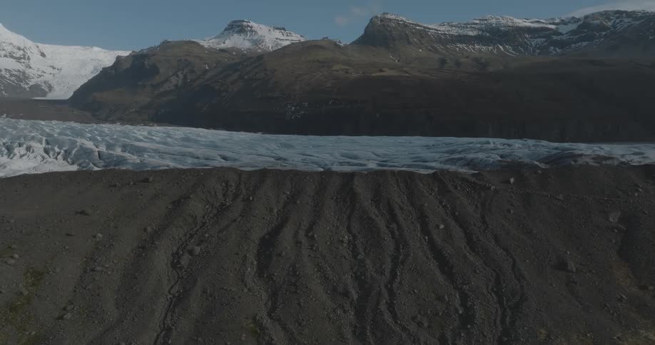 Aerial of landscape with mountains and frozen water