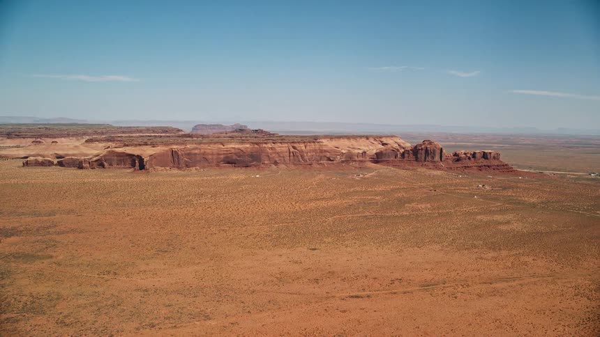 Aerial of a desert area with ruins at midday