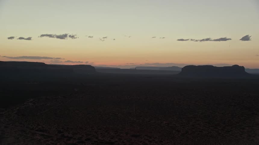 Mesa and hill at sunset