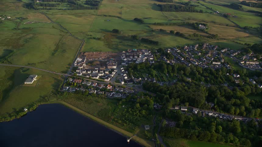 A small rural town next to a river
