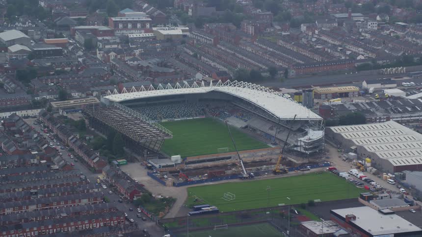 A stadium is in the middle of the city