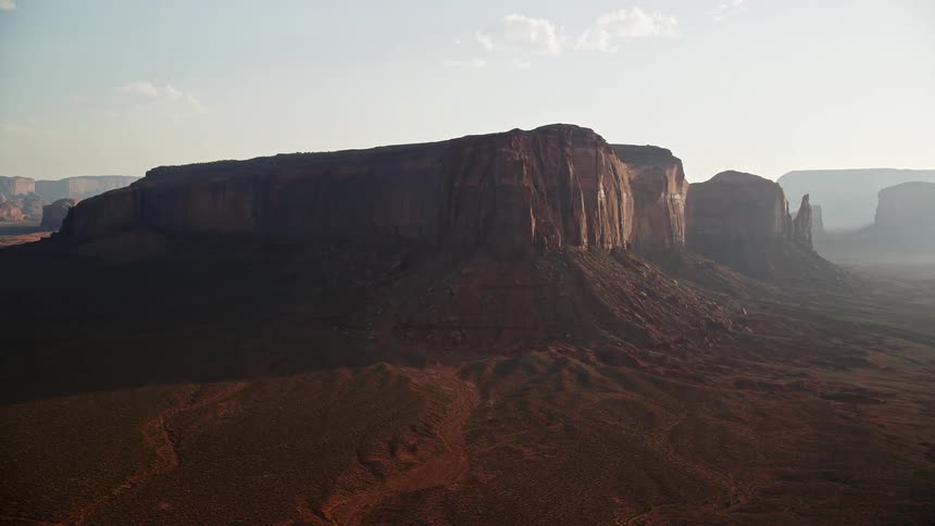 A mesa rock formation in a desert