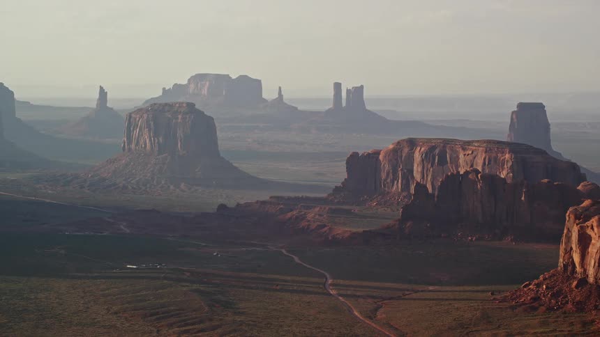 Aerial view of the plateaus rising amidst the vast desert