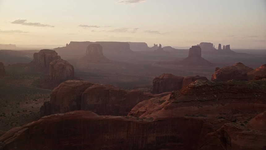 Aerial of butte formations in the desert on the landscape during the day