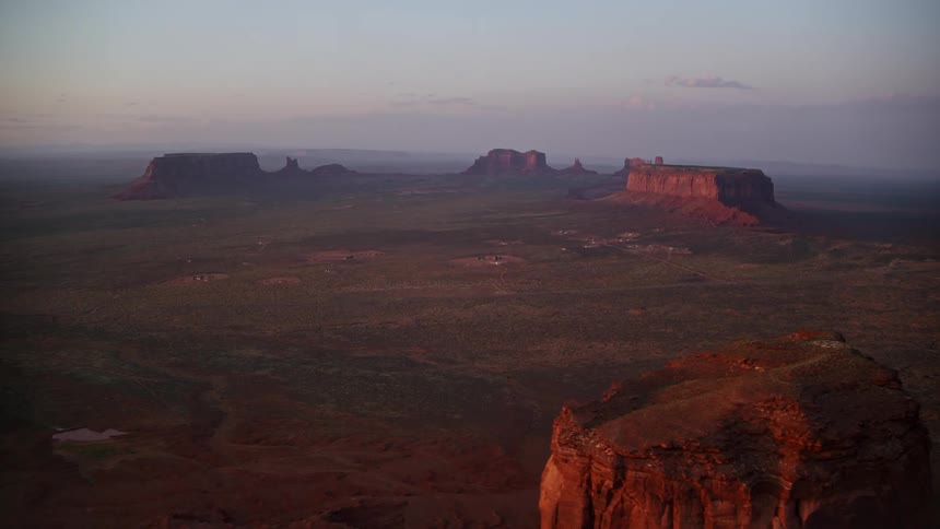 Aerial view of a valley with rocky and geological peaks