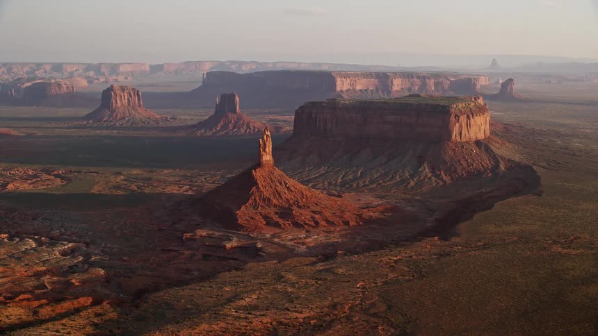 Aerial view of buttes and mesas in the badlands at sunset