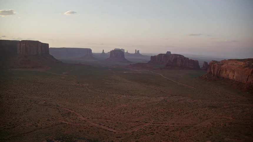 The rock formations form mountains ahead