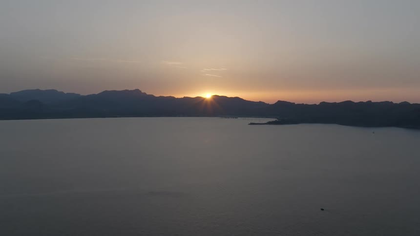 Dim sunlight over the mountain range