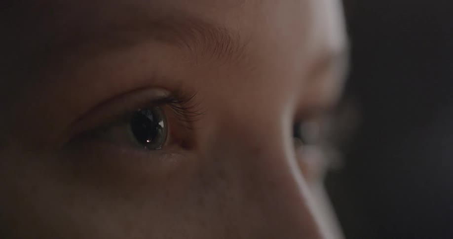 A person is staring ahead without blinking