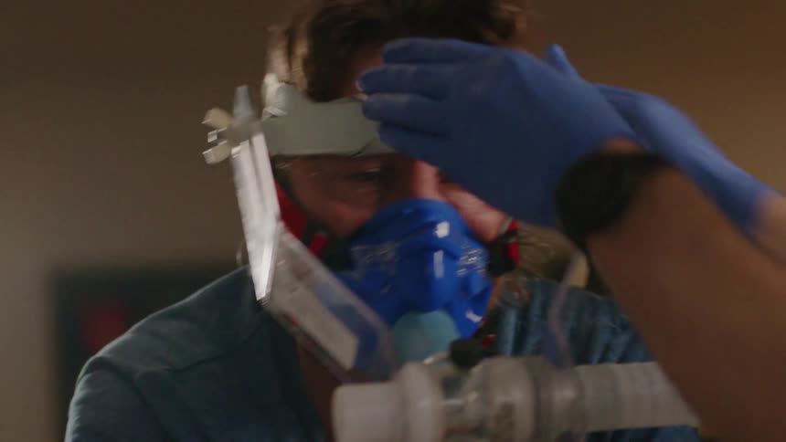 Portrait of a man undergoing a physical fitness test with an oxygen mask on his face