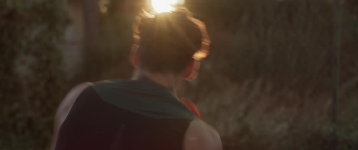 A man boxing alone in the evening