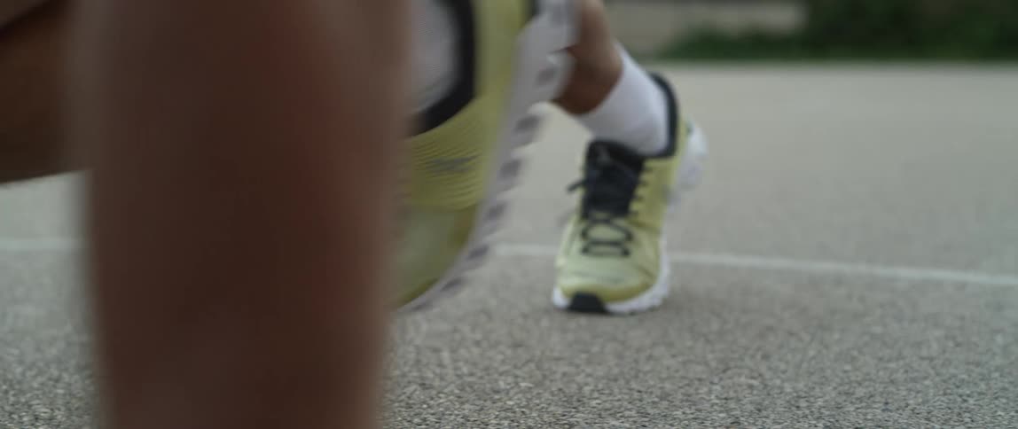 Closeup of a man doing cardio exercise with his hands and feet on the ground