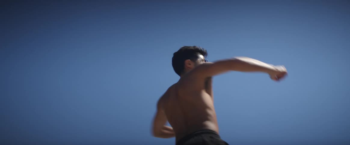 A skate dancer practicing on the tarred road