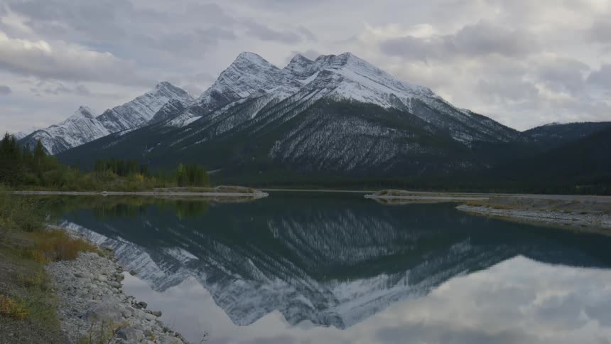 The water before this mountain is very calm