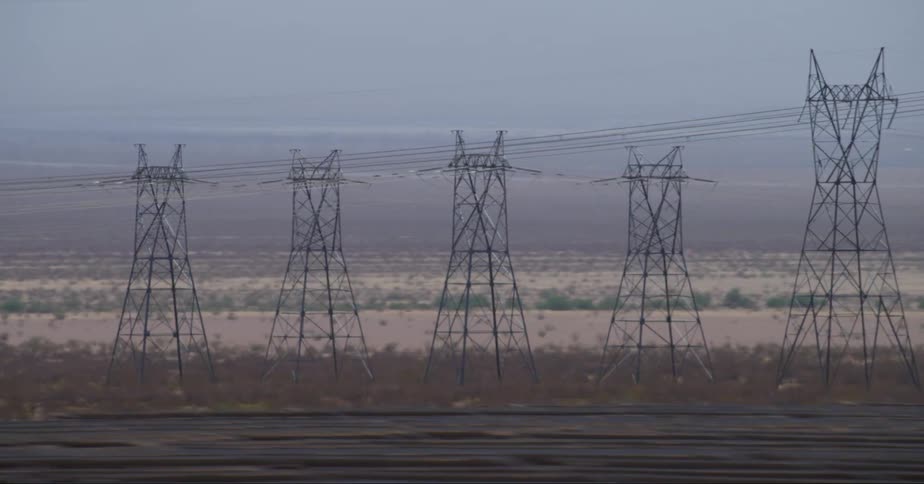 Wild flat landscape with electricity poles