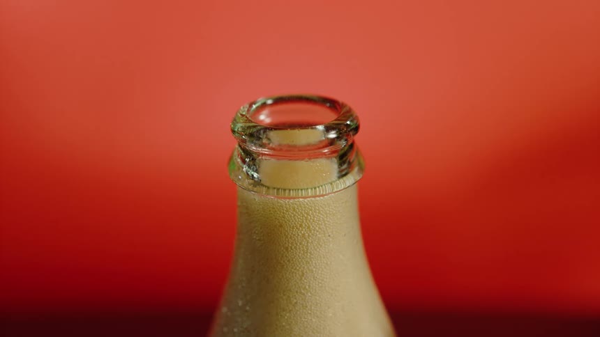 Sweet brown fizzy drink with bubbles
