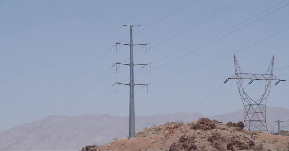 Two electrical towers in the desert