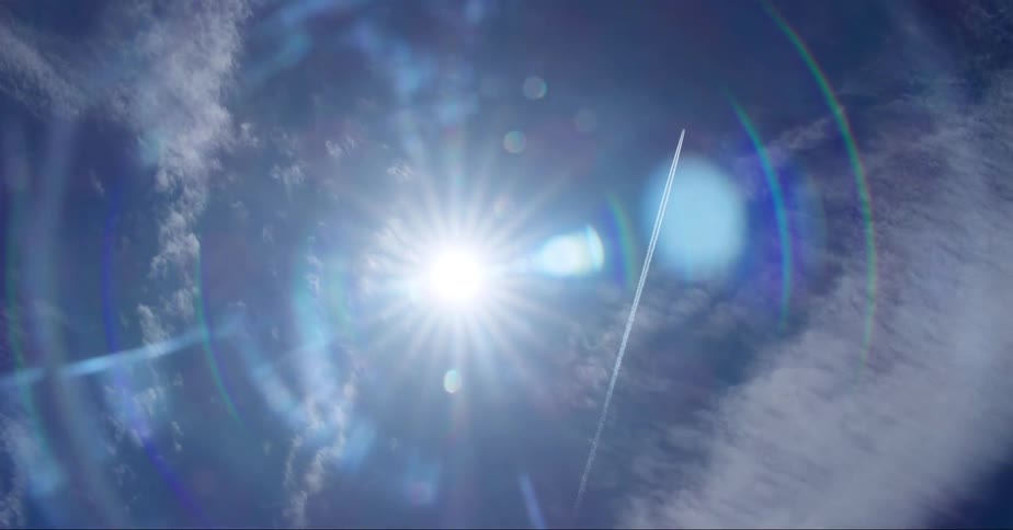 The sun is shining in the sky