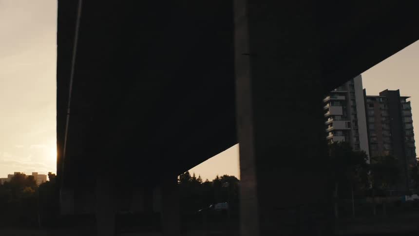 Building and overpass at dusk