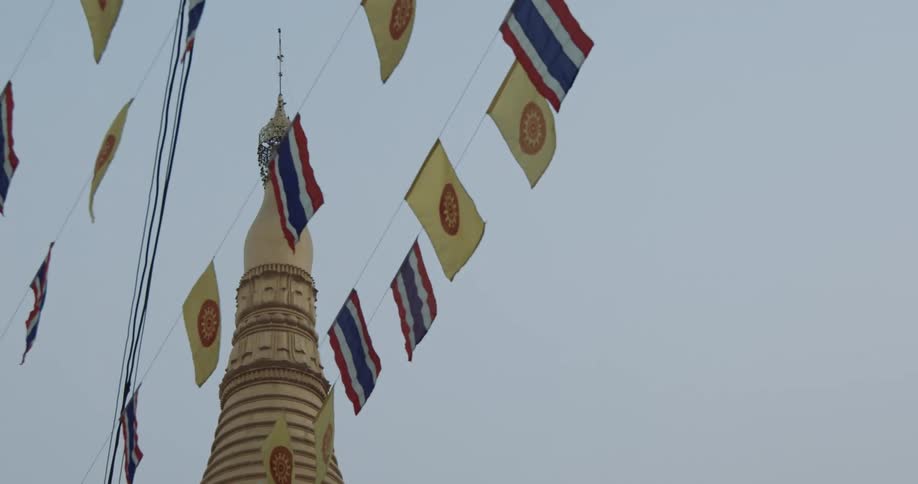 Prayer flags and stupa against sky
