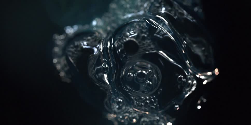 Transparent liquid in motion with abstract bubbles
