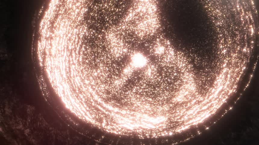 Expanding orb of shimmering sparkling bright lights over a dark backdrop