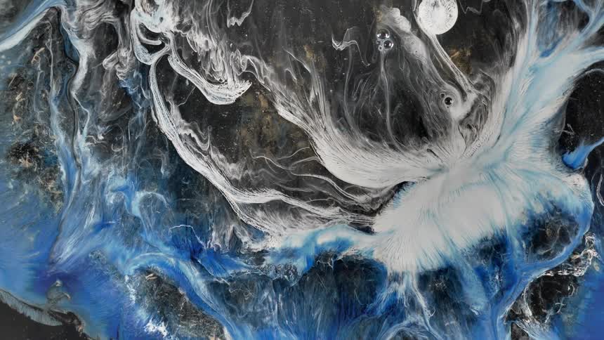 White and blue liquid flow down in abstract shapes