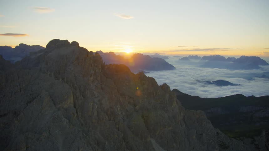 Aerial of rocky mountain while sunrise