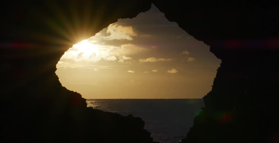 Sun flare on a cave in the evening