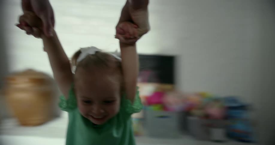 A mother and a daughter playing