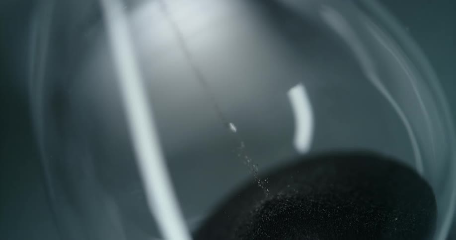 A close up video of a rotating hour glass