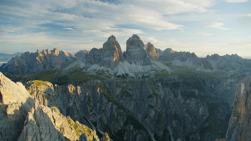 Aerial view of a landscape with peaks ridges valleys and geological rock formations