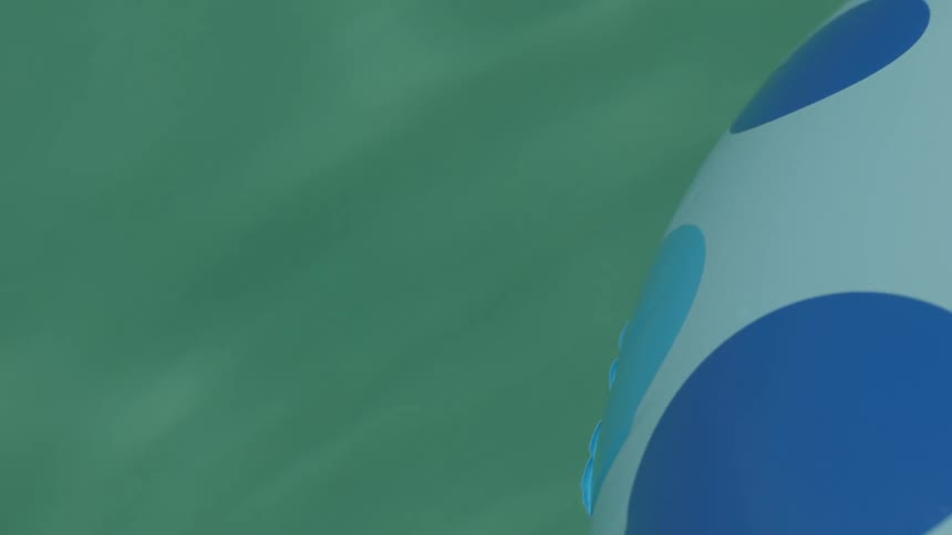 Blue round flotation device in a pool at midday