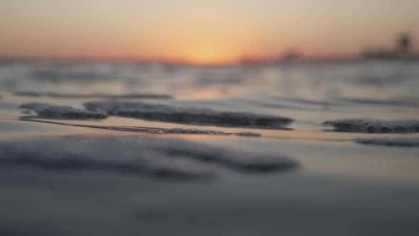 Dirt on the sea at sunset