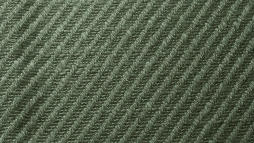 Extreme closeup of gray knit fabric