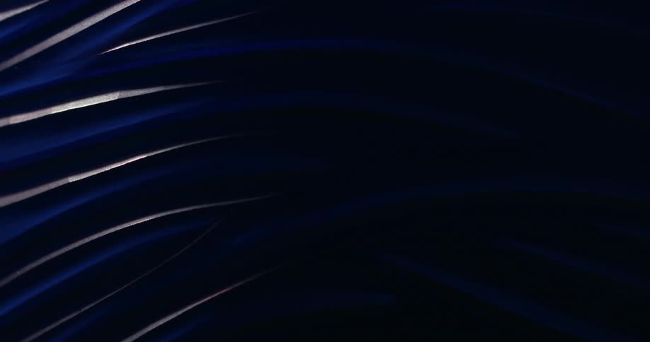 Objects shaped like blue lines being illuminated by light