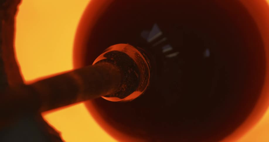 Closeup of a machine producing glass