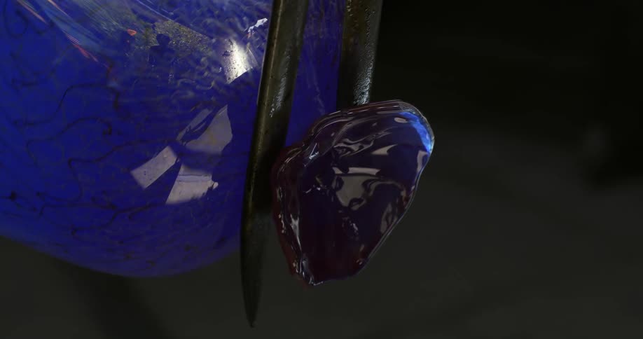 Blue vase being molded at its top
