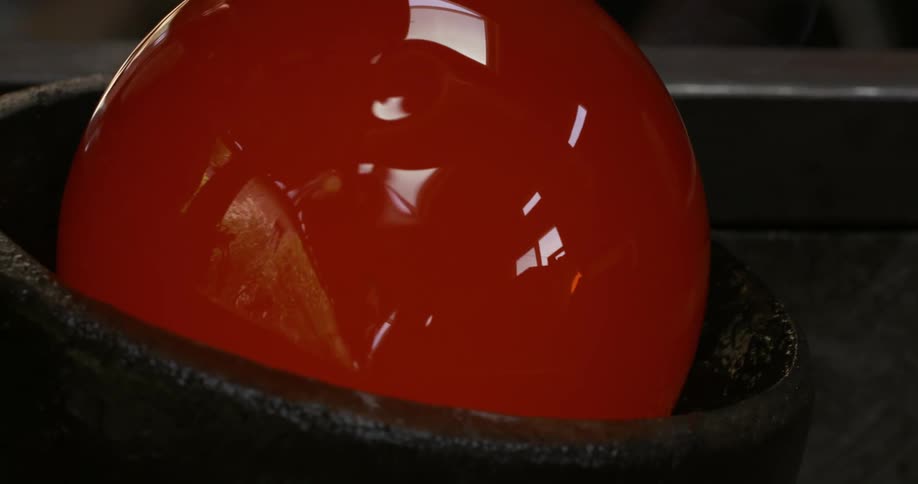 A solidstate sphere cooling superheated glass in a bowl of water