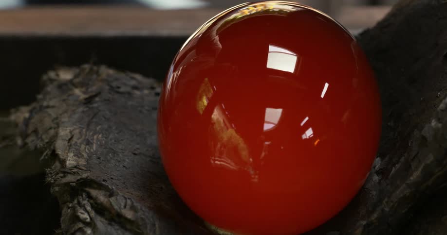 Cooling glass sphere emitting smoke
